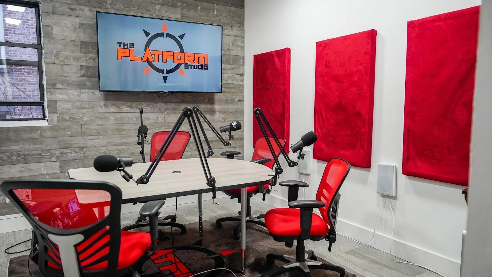 celebrity podcasters desk setup